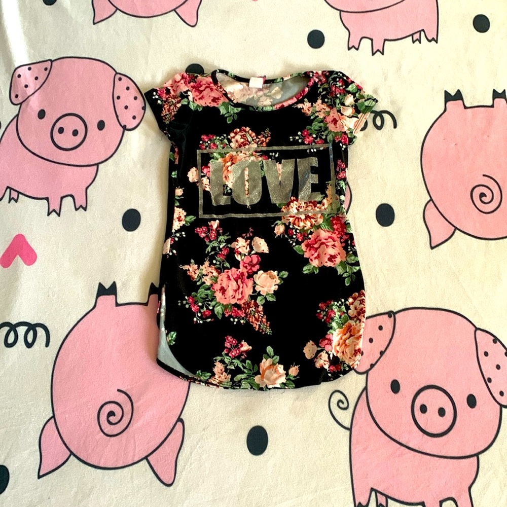 Very formal flower T-Shirt with the word love in the middle.